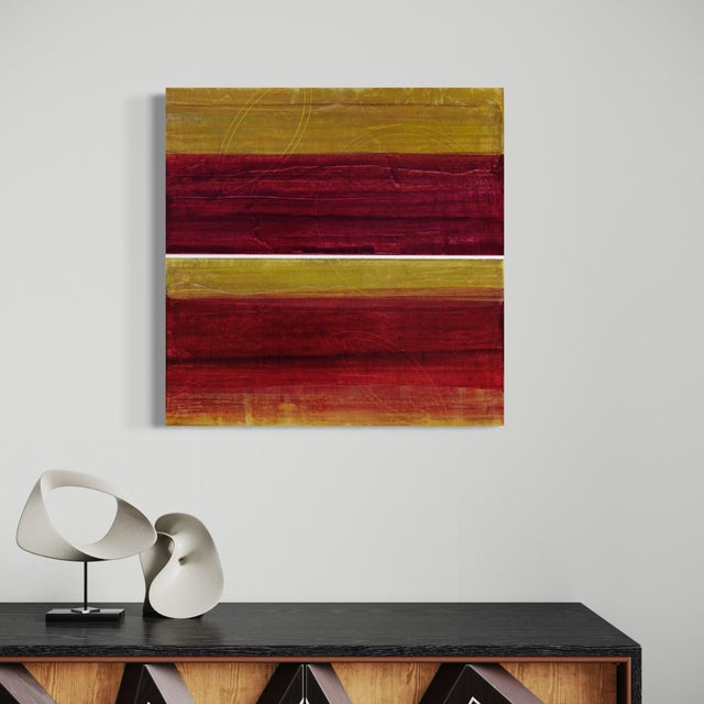 A deep, weathered field of crimson and burgundy spans this two-panel diptych, split by a thin white seam running between...