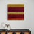 A deep, weathered field of crimson and burgundy spans this two-panel diptych, split by a thin white seam running between...