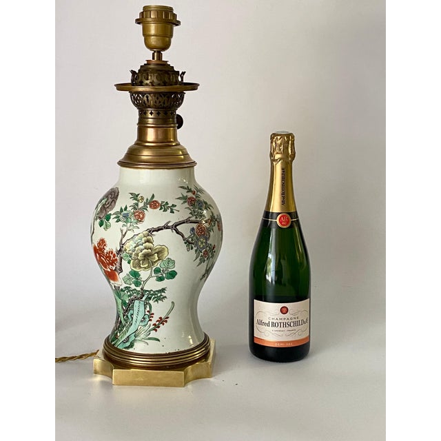 This table lamp is a 19th Century Famille rose vase lamp. It has been made in china circa 1880s. The mount is in brass,...