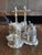 Stunning late 19th century silver plated cruet set featuring a cow tethered to a post. Includes two cut glass condiment...