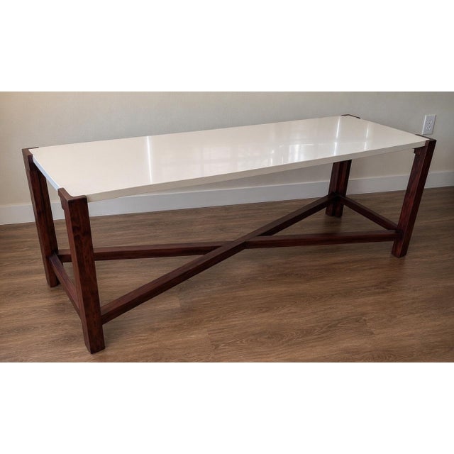 This exceptional dining table is a masterwork of refined contemporary design, conceived, engineered, and meticulously...
