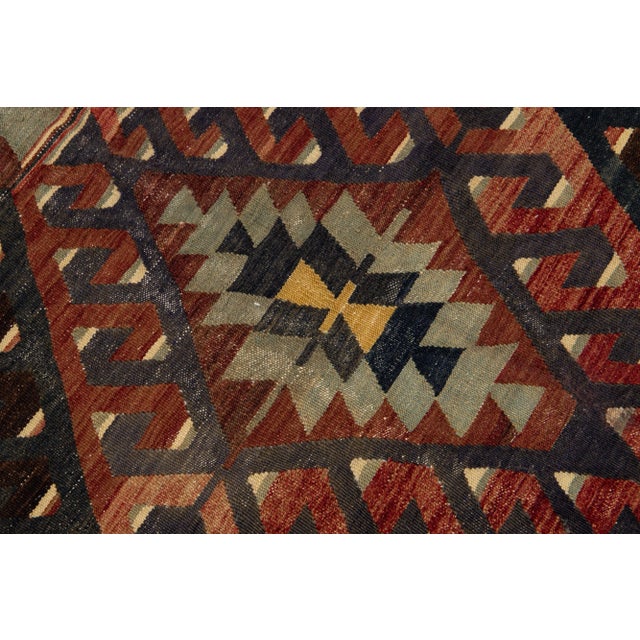 Beautiful Vintage Sumakh hand-knotted wool rug with multicolor accents in an all-over geometric design. This rug measures...