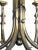 A handsome and large-scaled English neo-gothic brass 6-light chandelier; the central cluster column support emanating 6...