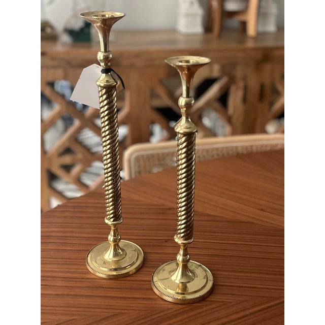 A Gorgeous set of graduated, twisted pillar, candlestick holders that will brighten up that table or add a little pizzazz...