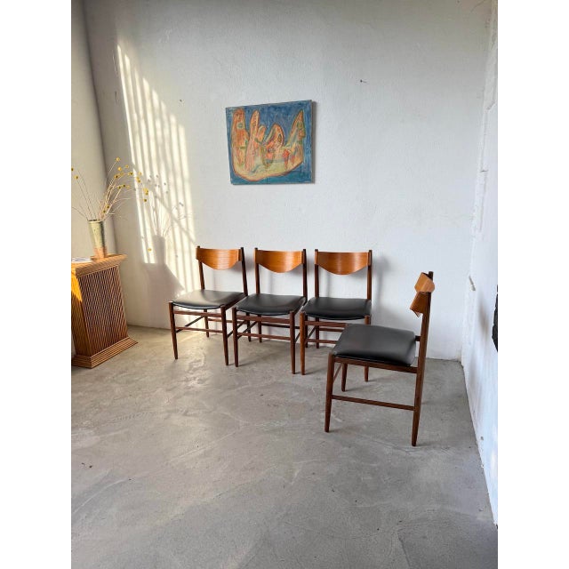 Set of four italian chairs from the 1960s, designed by gianfranco frattini for cassina. they are made of solid teak with...