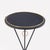 Each table features a painted iron top accented with bronze ring detailing encircling the surface and three hanging rings...