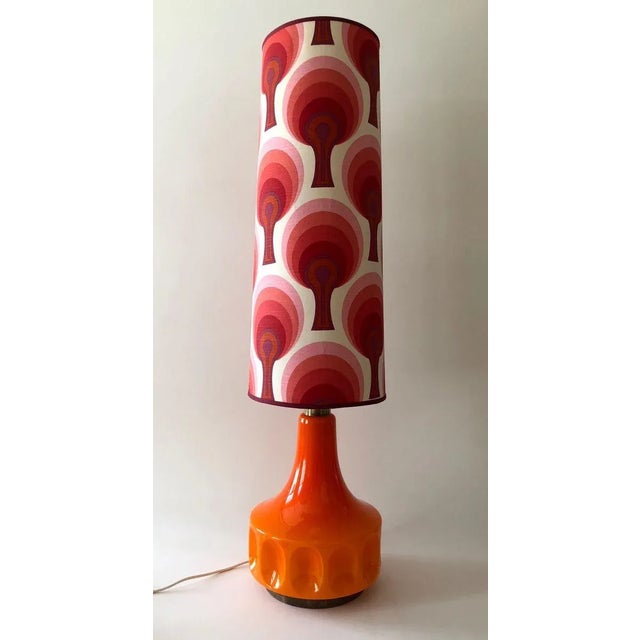An extra large midcentury floor or table lamp with a fabulous scalloped orange glass base. The original shade is equally...
