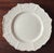 A fine 18th century saltglaze George II Rococo small plate with molded bas relief rim decoration around the shaped border....