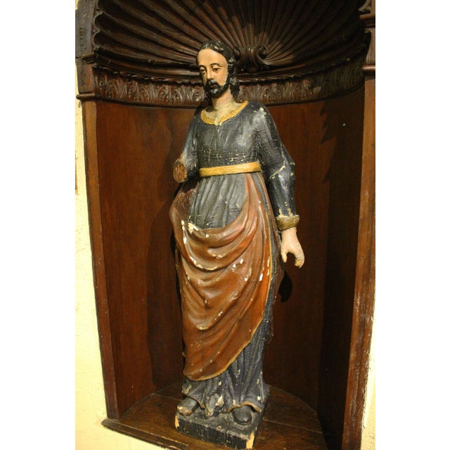 An 18th Century carved & polychromed Saint, various old repairs & losses, but truly great original surface! 42 1/2"h.