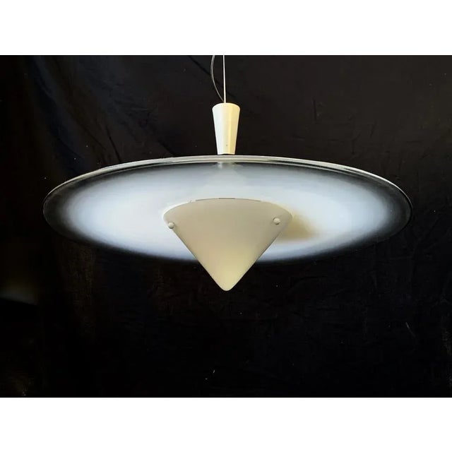 Fantastic chandelier of the 1970s in discreet conditions attributed to company i3. It is all original, it has only some...