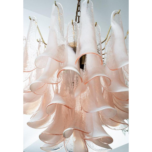 Murano glass pendant chandelier dating from around the 1970s, distinguished by its iconic "petal" design. Each individual...