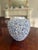 Behold the epitome of refined beauty in the handmade large round light blue ceramic flower vase. Meticulously crafted, its...