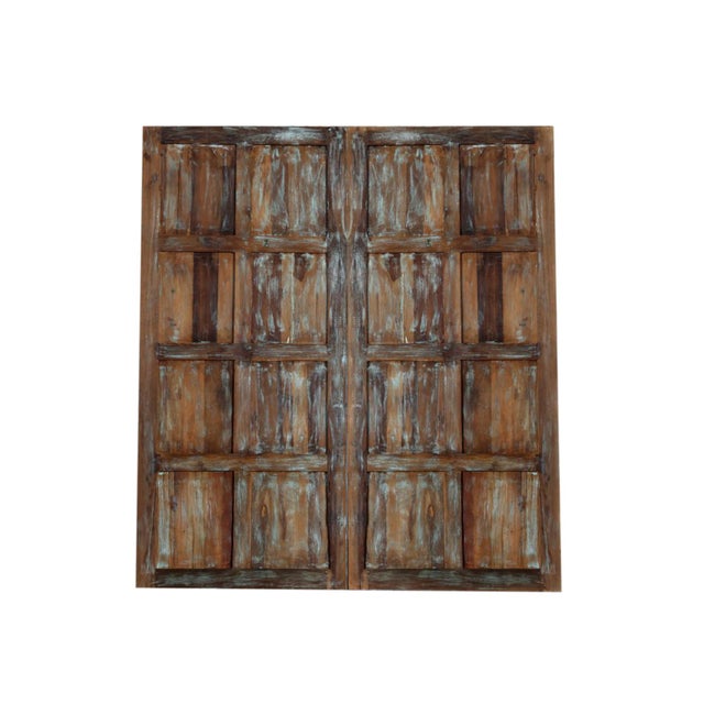 Transform your space with the timeless elegance of these floral carved wood French sliding doors. Expertly handcrafted...