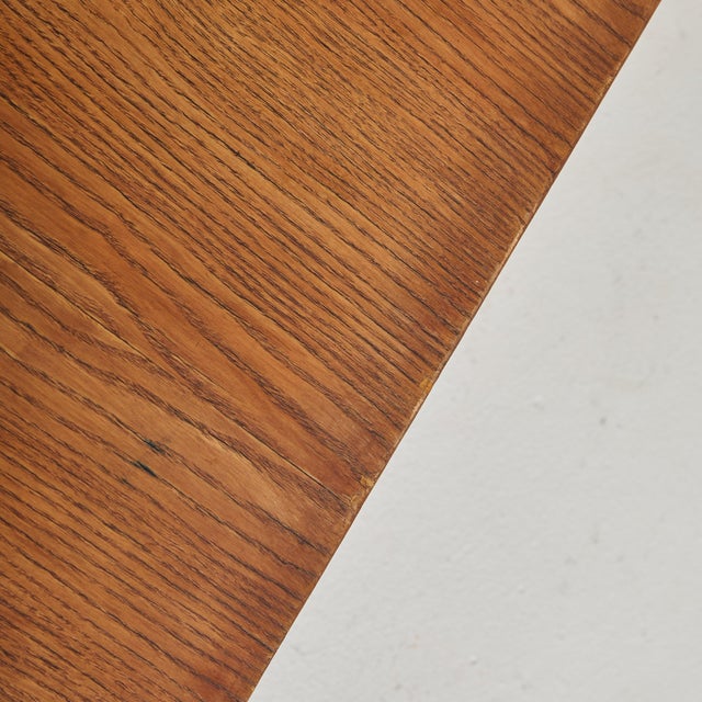 An ash wood coffee table designed by Georges Candilis and Anja Blomstedt in 1969 for the resort Les Carrats in Port-...