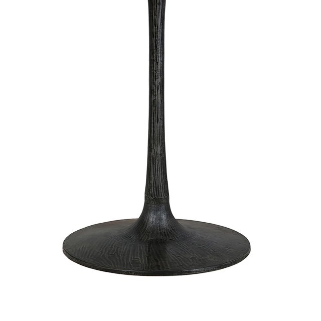 The Starburst Round Dining Table is made from thin, pie-shaped wood slices, radiating a rustic charm. The tabletop is...