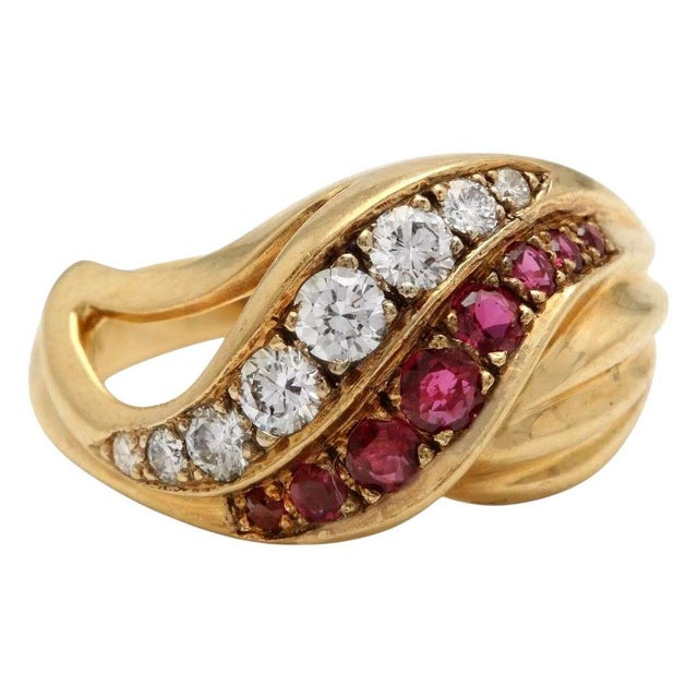 Vintage Natural Ruby and Natural Diamond 14K Solid Yellow Gold Ring Ruby Treatment: Untreated Total Round Ruby Weight is:...