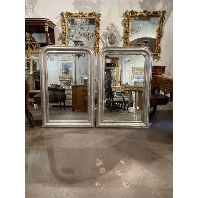 Fabulous pair of French Louis Philippe mirrors with decorative X pattern. Beautiful patina and nice clean lines. Perfect...