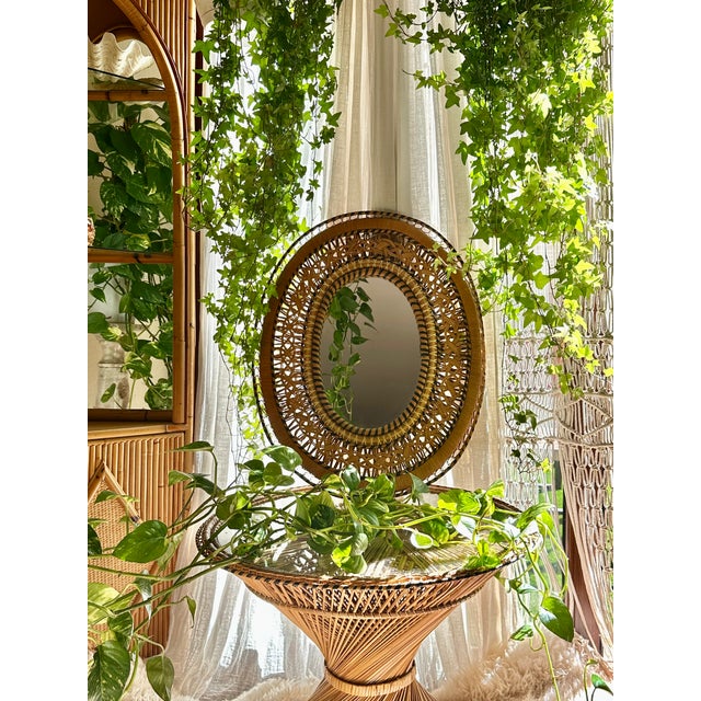 A splendid vintage handcrafted mirror from the original collection of the film Emmanuelle, a symbol of natural sensuality...