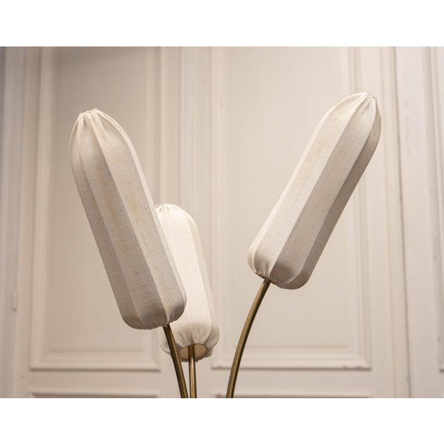 Elegant sculptural floor lamp produced by bergboms, sweden, dating from the 1950s. the lamp features a distinctive vase-...
