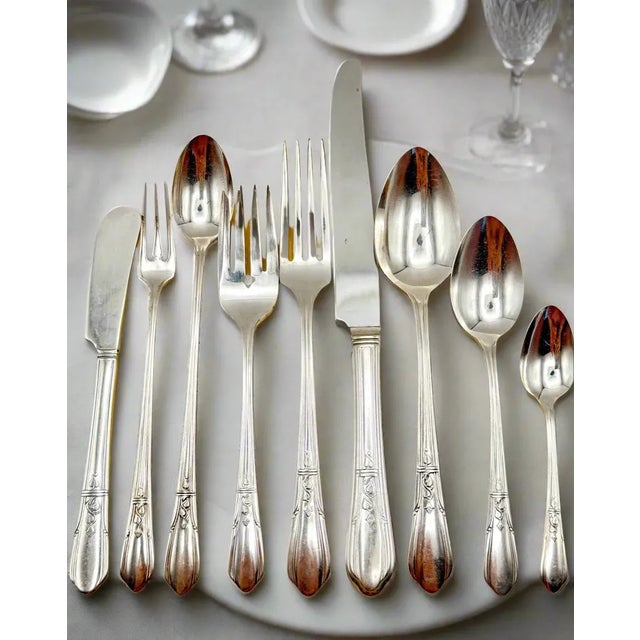 Offered here is an 82-piece silverplate flatware set in the “Countess II” pattern (introduced 1936) by Simeon L & George H...