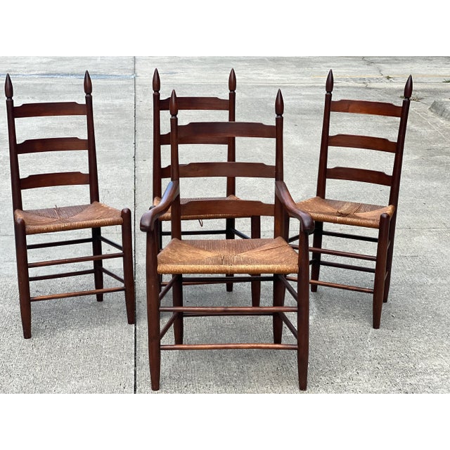 Set of (4) gorgeous rush seating ladder back chairs. You have (3) standard and (1) captains chair. Stunning collection....