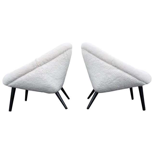 Original 1950s lounge chairs, faux sheepskin and black painted wood legs. Faux sheepskin is new and in great condition....