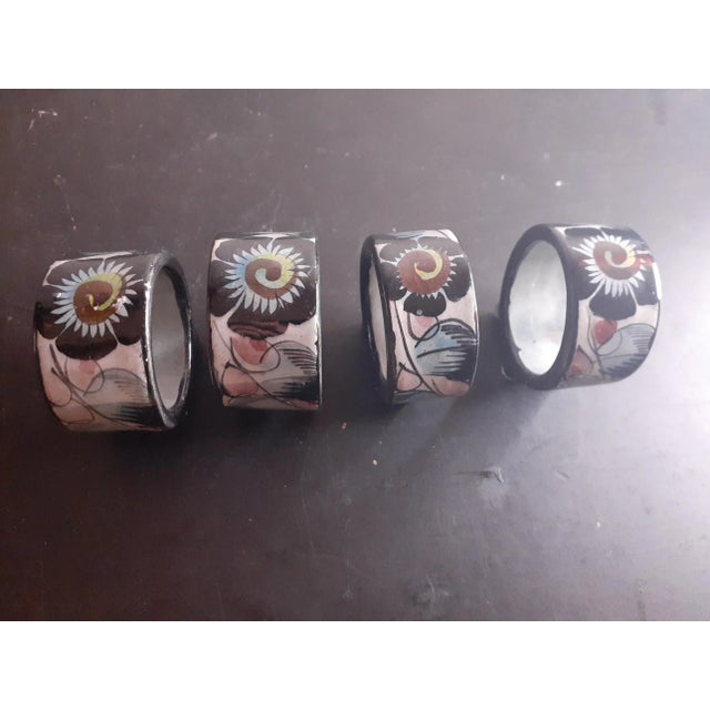 These are GORGEOUS Mexican Tonala Art Ceramic 2" Napkin Rings Set of 4. Procured at auction BOX 36