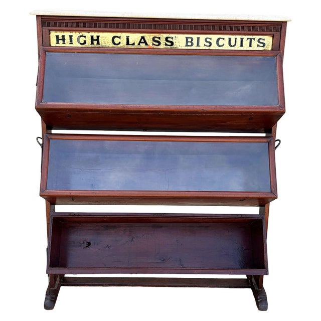 A “High Class Biscuits” Victorian Period Mahogany Trade Display Biscuit Cabinet. This is a rare and highly decorative late...