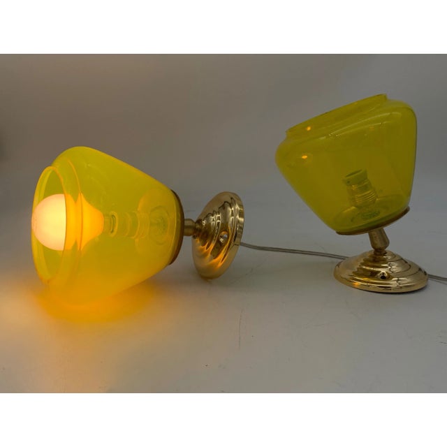 Pair of vintage sconces made in Italy from around the 1970s. Vintage objects, restored. Gold-plated iron frame. The...