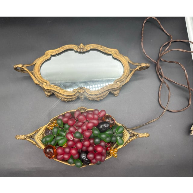 This 1920’s Czech coupe and mirrored plateau with its bouquet of Bohemian glass fruits is in working condition, as seen in...