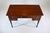 19th C. solid Mahogany writing desk table. Features four dovetail, cockbeaded drawers fitted with original brass knobs...