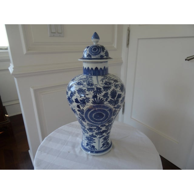 Vintage late 20th century Blue and white Vase with Top. Unmarked at bottom