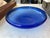 Large Mid Century Cobalt / Royal Blue Glass Bowl. Wide rim curved inward measuring 11.75” in diameter. The glass bowl...
