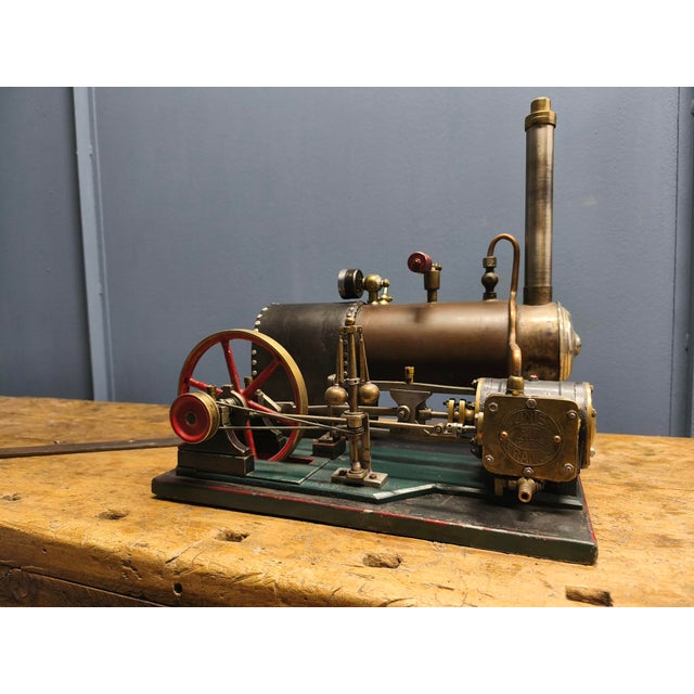 This steam engine was made in france in the late 19th century, early 20th century. A very nice, decorative piece. I only...