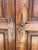 This is a charming pair of French Regence/Louis XV pine armoire doors. The doors appear to retain their original waxed...