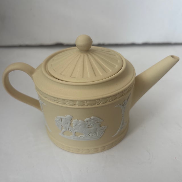 Vintage Wedgwood Primrose Yellow Miniature Jasperware Teapot – Ulysses Pattern in Primrose Yellow with Cream This piece is...