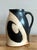 This striking original studio pottery pitcher is a masterclass in Modernist graphic design and organic form. Hand-crafted...