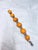Beautiful vintage Polish Baltic amber bracelet featuring six large egg yolk butterscotch amber cabochons set in...
