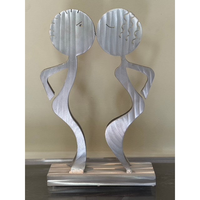 Elevate your space with this striking, authentic postmodern table sculpture titled "The Kiss" by celebrated American...