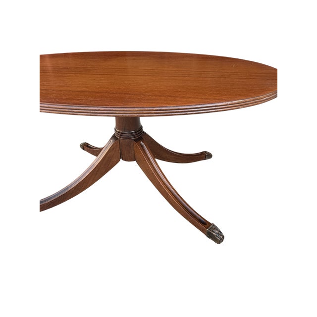 Brown Vintage Duncan Phyfe Style Mahogany Oval Coffee Table – Federal Neoclassical Pedestal Base With Reeded Saber Legs & Brass Claw Feet For Sale - Image 8 of 9