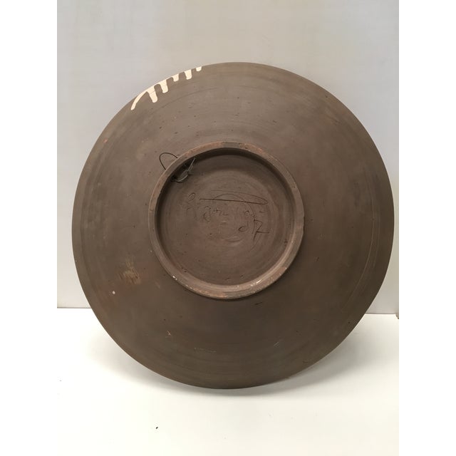 About 20th century Stoneware Matte dish with ornamentals relief motifs. Details PRODUCTION TIME Available Now IN THE STYLE...