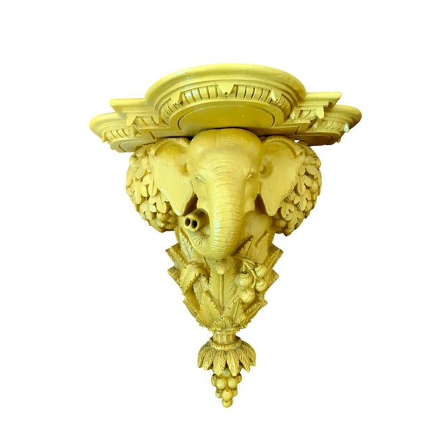 Palm beach regency pair of elephant wall brackets ornately decorated with palms and fruit in striking yellow lacquer ....