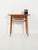 Scandinavian teak bedside table from the 1960s, slender and light, with a suspended drawer and elegantly tapered turned...