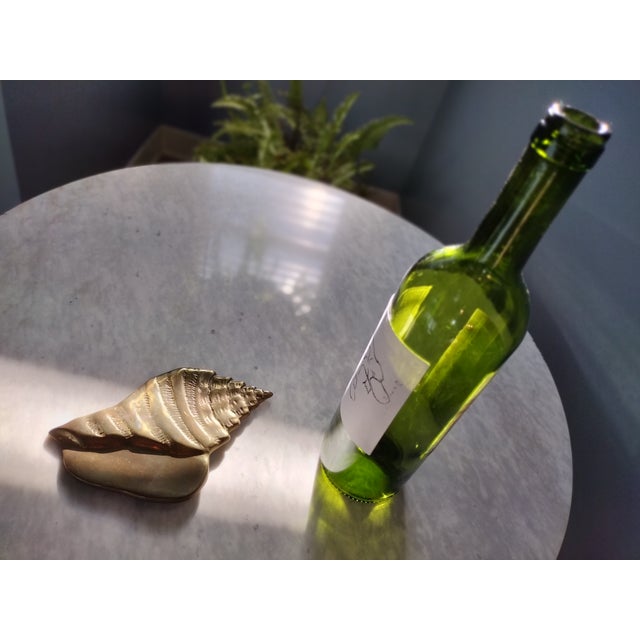 A beautiful vintage brass sea shell wall hanging. This brass wall hanging would make a great standalone gift or work as...