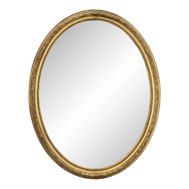 French 19th Century Louis XVI Style Giltwood Oval Mirror For Sale