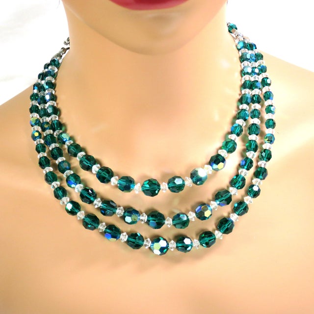 1950s crystal necklace, bracelet, clip-back earrings. Three-strand necklace, two-row memory wire bracelet, and button...