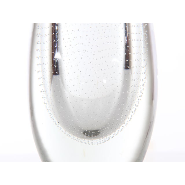 This Gunnel Nyman glass vase was manufactured by Nuutajärvi in Finland. This piece is attributed to the mentioned...