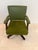 Bring vintage sophistication and everyday function to your workspace with this Mid-Century executive desk chair. Featuring...