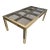 Vintage brass and bronze tinted glass panel parsons dining table by Mastercraft. Manufactured in the 1980s this epic...