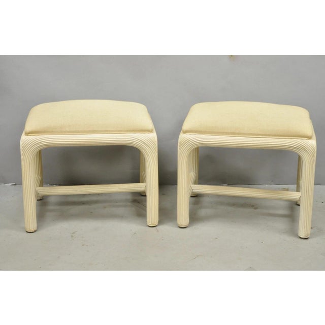 Vintage Hollywood Regency Rattan Pencil Reed Stretcher Base Stools by American Drew with Beige Linen Upholstery - a Pair....